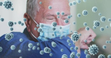 Bild von covid 19 Zellen über den Mann mit Gesichtsmaske. Global Covid 19 Pandemiekonzept digital generiertes Bild.