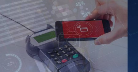 Image of graphs and financial data over payment terminal. Global business data processing and connections concept digitally generated image.