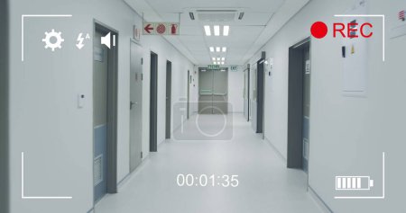 Bild eines Krankenhausflurs, gesehen auf dem Bildschirm einer Digitalkamera im Aufzeichnungsmodus mit Icons und Timer