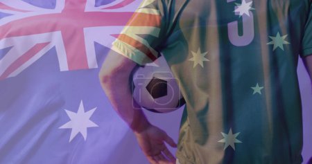 Photo for Image of caucasian male soccer player over flag of australia. Global patriotism, celebration, sport and digital interface concept digitally generated image. - Royalty Free Image