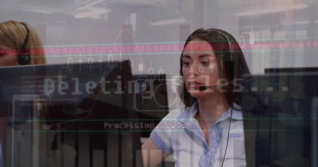 Image of financial graphs and data over caucasian female call center worker. Business, call center, data safety and working with technology concept digitally generated image.