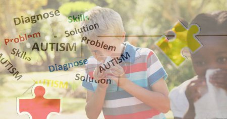 Image of colourful puzzle pieces and autism text over kids friends sneezing noses. autism, learning difficulties, support and awareness concept digitally generated image.