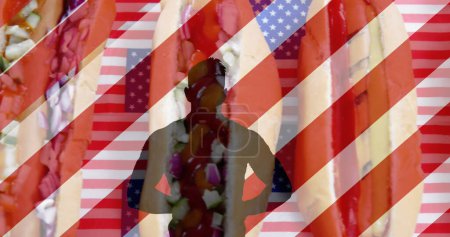 Photo for Image of white and red stripes and human silhouette over hot dogs. presidents day, independence day and american patriotism concept digitally generated image. - Royalty Free Image