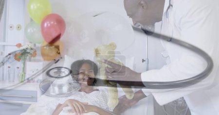 Photo for Image of stethoscope over african american doctor and patient. global medicine, healthcare and technology concept digitally generated image. - Royalty Free Image