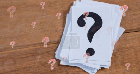 Photo for Image of question marks on wooden background. education, knowledge and school concept digitally generated image. - Royalty Free Image