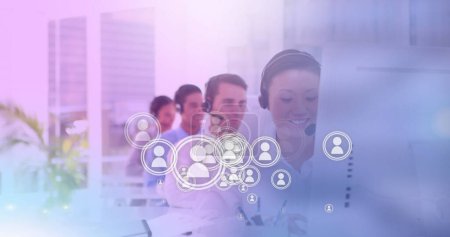 Photo for Image of network of digital people icons over team of colleagues with phone headsets in office. global business, finances and networking concept digitally generated image. - Royalty Free Image