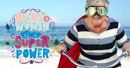 Photo for Image of girl power text over superhero grandmother. female power, feminism and gender equality concept digitally generated image. - Royalty Free Image