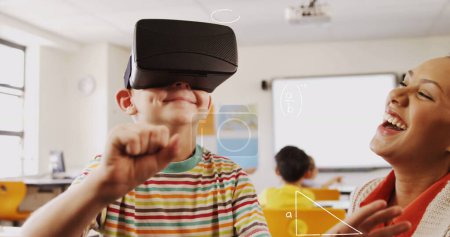 Photo for Composite image of math concept icons against caucasian boy wearing a vr headset at school. school and education concept - Royalty Free Image