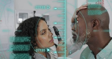 Image of data processing over diverse male patient and doctor checking sight. Medicine, health and digital interface concept, digitally generated image.