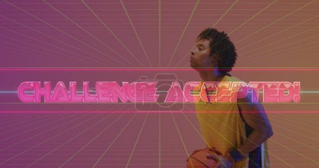 Image of challenge accepted text over neon pattern and biracial basketball player. Sports, competition, image game and communication concept digitally generated image.