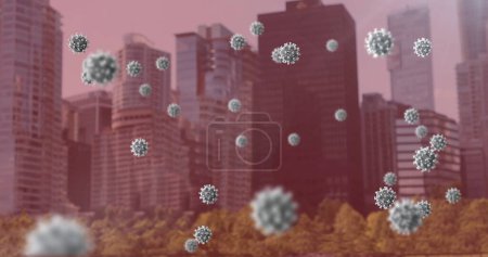 Foto de Imagen de covid 19 células flotando sobre paisaje urbano sobre fondo rosa. global coronavirus covid 19 pandemic concept digitally generated image. - Imagen libre de derechos