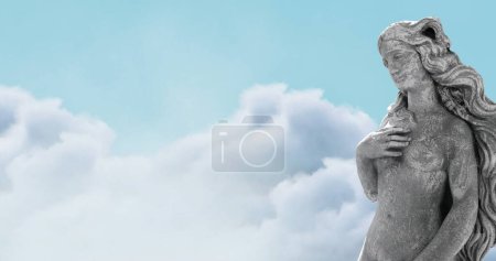 Photo for Image of gray sculpture of woman over blue sky and clouds, copy space. Abstract background, art and statuary concept, digitally generated image. - Royalty Free Image