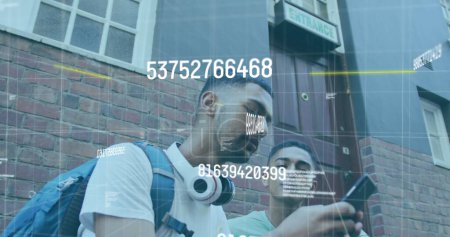 Image of data processing over biracial male friends using smartphone. Global business and digital interface concept digitally generated image.