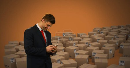 Photo for Image of man using smartphone with stacks of boxes on orange background. global shipping and technology concept digitally generated image. - Royalty Free Image