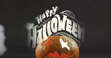 Foto de Happy halloween text banner and multiple ghosts icons against smoke effect over halloween pumpkin. Halloween festividad y concepto de celebración - Imagen libre de derechos