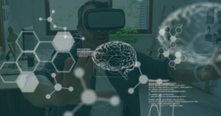 Photo for Image of scientific data over caucasian man wearing vr headset in office. business, science and working with technology concept digitally generated image. - Royalty Free Image