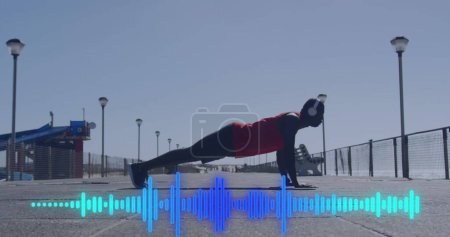 Photo for Image of digital interface over exercising african american man. Global connections, wellbeing, fitness and healthy lifestyle concept digitally generated image. - Royalty Free Image