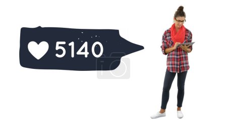 Photo for Front view of a Caucasian woman checking her phone in a white background. Beside her is a digital image of a message bubble with a heart icon and a number count up 4k - Royalty Free Image