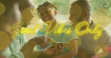 Photo for Image of good vibes only text over african american family using smartphone. enjoying quality leisure time at home using technology concept digitally generated image. - Royalty Free Image