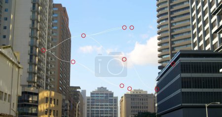 Composite image of network of connections against tall buildings in background. Global networking and technology concept