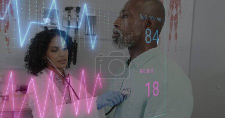 Photo for Image of colourful cardiographs over diverse patient and doctor treating. Medicine, health and digital interface concept, digitally generated image. - Royalty Free Image