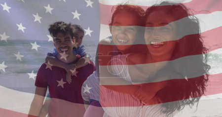 Téléchargez les photos : Image du drapeau des États-Unis d'Amérique sur un couple biracial portant des enfants. Patriotisme américain, diversité et concept de tradition image générée numériquement. - en image libre de droit