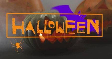Photo for Image of happy halloween text with bat and spider over carved pumpkins. halloween tradition and celebration concept digitally generated image. - Royalty Free Image