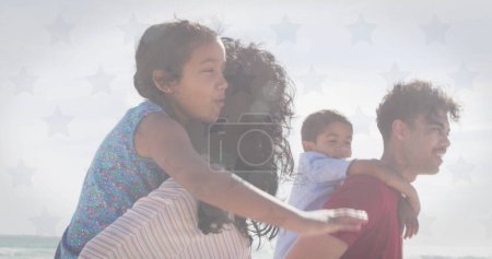 Photo for Image of flag of united states of america over biracial couple with son and daughter piggyback. American patriotism, diversity and tradition concept digitally generated image. - Royalty Free Image