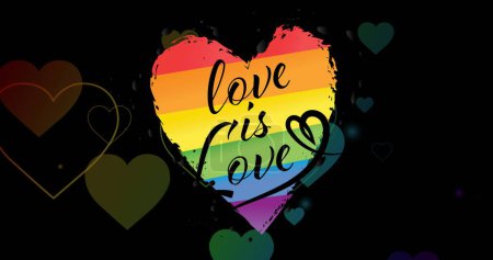 Foto de La imagen del amor es el texto del amor y los corazones del arco iris. Orgullo mes, lgbtq, derechos humanos e igualdad concepto de imagen generada digitalmente. - Imagen libre de derechos