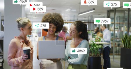 Image of notification bars over diverse coworkers standing and discussing reports on laptop. Digital composite, multiple exposure, business, planning, teamwork, social media reminder, technology.
