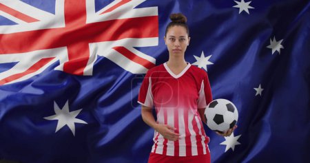 Photo for Image of biracial female soccer player over flag of australia. Global patriotism, celebration, sport and digital interface concept digitally generated image. - Royalty Free Image