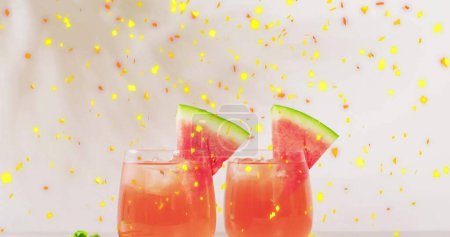 Photo for Image of confetti falling and cocktails on white background. Party, drink, entertainment and celebration concept digitally generated image. - Royalty Free Image