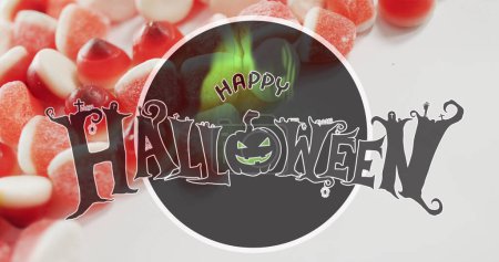 Photo for Happy halloween text banner against close up of candy corns on white surface. halloween festivity and celebration concept - Royalty Free Image