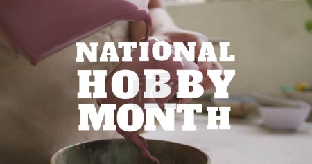Photo for Image of national hobby month text over hands of caucasian man forming pottery. hobby and celebration concept digitally generated image. - Royalty Free Image
