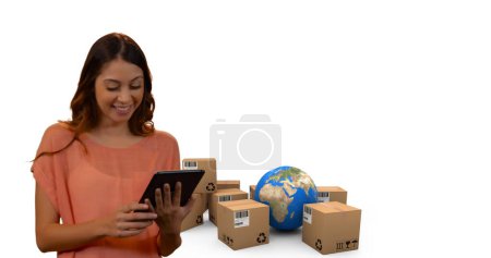 Photo for Image of woman using tablet with stacks of boxes and globe on white background. global shipping and technology concept digitally generated image. - Royalty Free Image