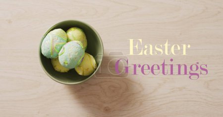 Image of easter eggs and easter greetings text. easter, tradition and celebration concept digitally generated image.