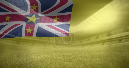 Image of flag of niue over sports stadium. Global sport and digital interface concept digitally generated image.