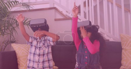 Image of smiling african american siblings using vr headsets. national siblings day and celebration concept digitally generated image.