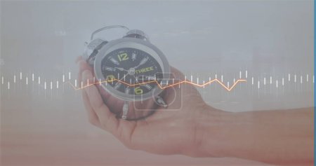 Image of data processing over hand with clock. Global business and digital interface concept digitally generated image.