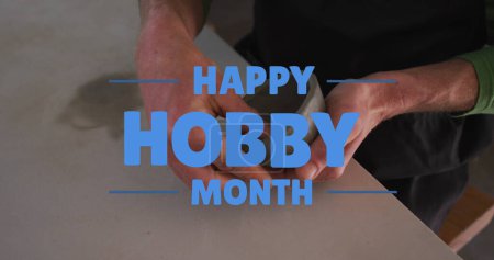Photo for Image of happy hobby month text over caucasian man forming pottery. hobby and celebration concept digitally generated image. - Royalty Free Image