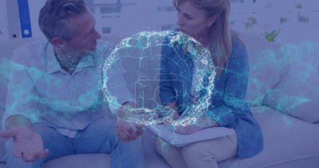 Image of digital brain over caucasian man consulting psychologist. Mental health, therapy and healthcare concept digitally generated image.