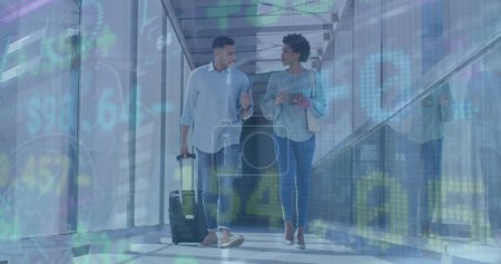 Image of trading board over multiracial coworkers discussing while walking at airport. Digital composite, multiple exposure, stock market, investment, business travel and communication concept.