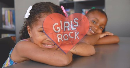 Image of girls rock text over school girls. female power, feminism and gender equality concept digitally generated image.