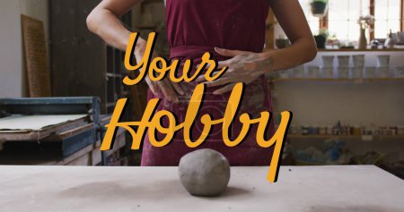 Photo for Composite image of your hobby text banner against mid section of female potter cleaning her hands. hobby and pottery concept - Royalty Free Image