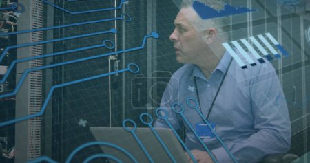 Photo for Image of scan scoping over caucasian male server room worker. Global connections, data processing and digital interface concept digitally generated image. - Royalty Free Image