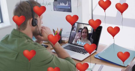 Photo for Man with headphones in a video call with a teenage girl. They are sharing a virtual moment, surrounded by digital heart balloons. - Royalty Free Image