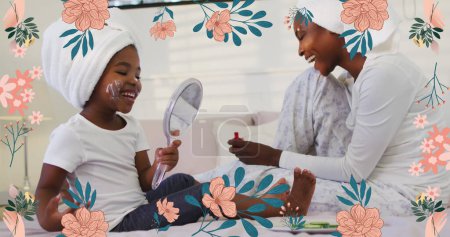 Téléchargez les photos : Image de fleurs roses sur heureuse mère afro-américaine et sa fille utilisant des produits de beauté. famille, unité, santé et bien-être concept image générée numériquement. - en image libre de droit