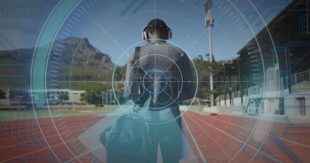 Photo for Image of digital data processing over disabled male athlete walking on racing track. global sports, competition, disability and digital interface concept digitally generated image. - Royalty Free Image