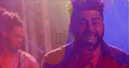 Image of colourful light swirls and spray paint over diverse male singer and musician performing. Live music, creativity, performance and entertainment concept digitally generated image.