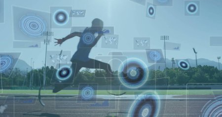 Photo for Image of digital data processing over disabled male athlete with running blades on racing track. global sports, competition, disability and digital interface concept digitally generated image. - Royalty Free Image